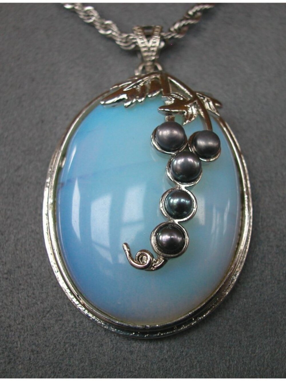 Silver-Tone Pendant with Iridescent Blue Opalite Cabochon with Dark Pearl Grape